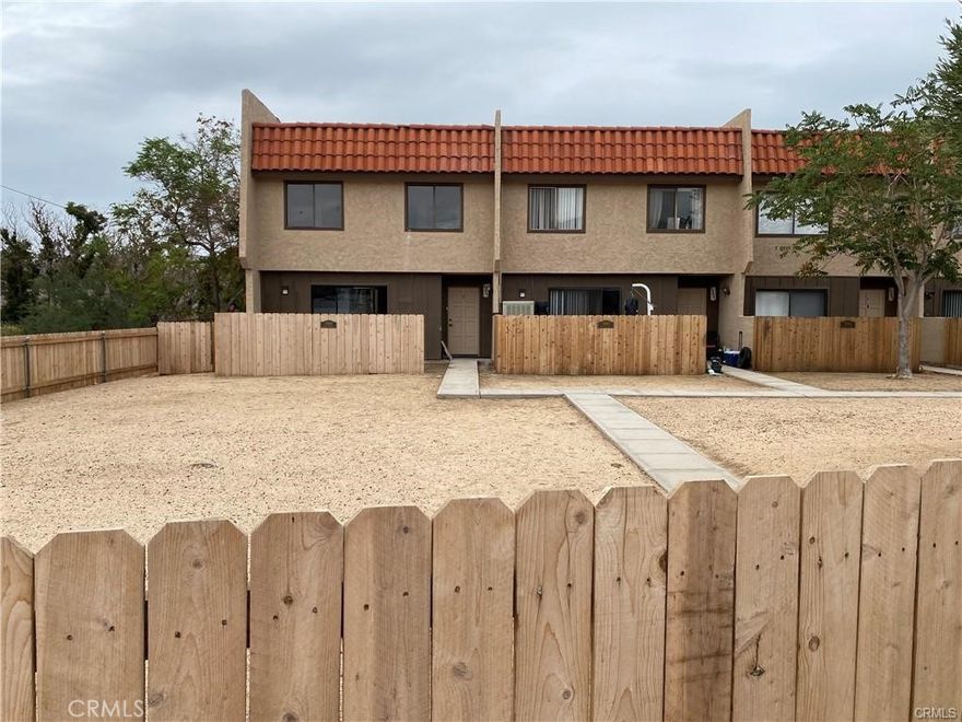 Location, location, location !3-Bedroom, 2.5-Bath Condo in Yucca Valley, Ready for You to Make Your Own! Needs some work! What a bargain! Spacious at 1701 square feet of living area. Downstairs: kitchen, living room, half bath, laundry, and patio. Upstairs – 3 bdrms & 2 baths. Very close to coffee shops, the downtown shopping area, and near Palm Springs and Joshua Tree National Park! The property features two parking spaces (1 covered, one uncovered), with Wood fencing surrounding the entire north side of the complex. Each unit has its patio fenced in with wood (no gate), and the HOA prohibits dogs on the Property Due to the Proximity to the City Sewer.

Live in or Rent! Great Views. Clear skies & starlit nights. Located close to Old Town, within walking distance to New Frontier Coffee, a laundry room is situated inside, under the stairs, with ample storage space. 



This 3-bedroom, 2.5-bath condo in Yucca Valley is ready for you to make it your own! It needs some work!



**Property Details:**



- **Downstairs:** Kitchen, living room, half bath, laundry room, and patio.

- **Upstairs:** 3 bedrooms and 2 bathrooms.



The condo is conveniently located near coffee shops, the downtown shopping area, and is close to Palm Springs and Joshua Tree National Park!!



This condo is ideal for both living in and renting out. 



This is an excellent opportunity for first-time buyers or investors. Call to schedule a viewing today! This makes for a great 1st time buyer or investor. Call, take a look, see!
