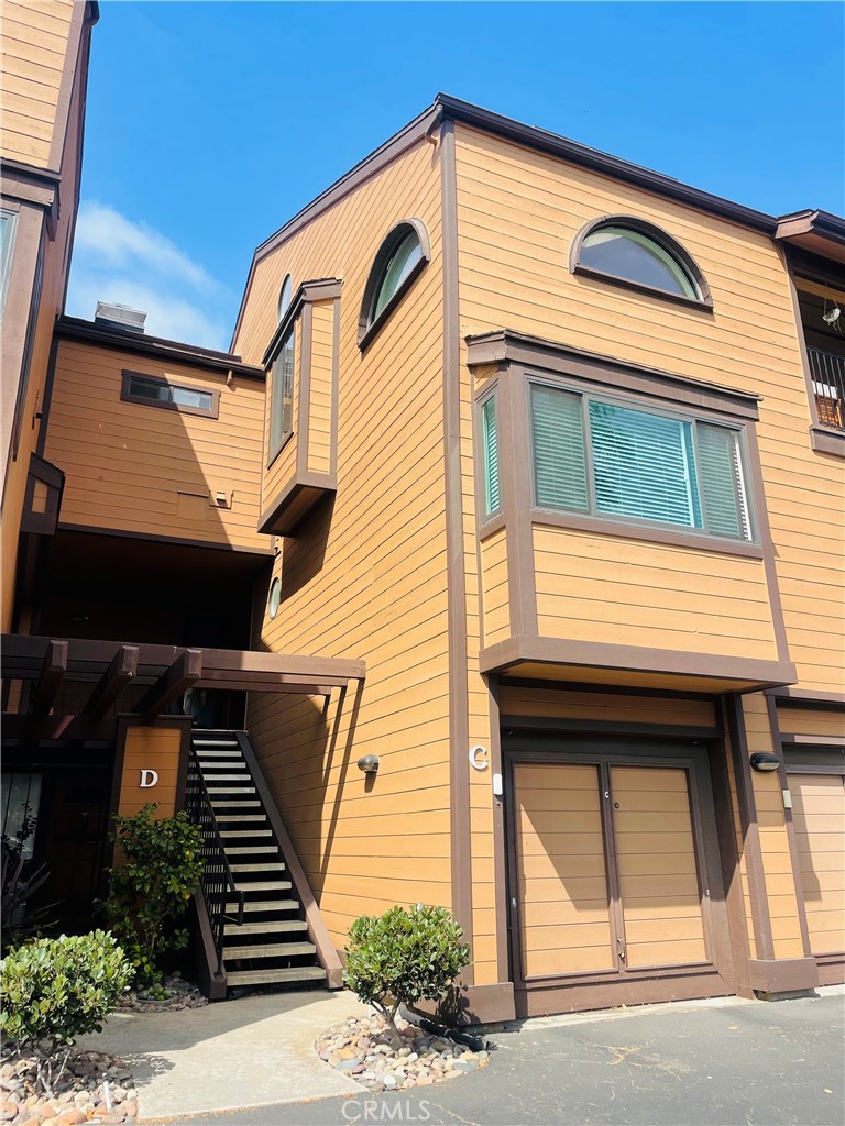 Walk To The Beach from this 4 room condo located at Windsong Cove! Live your best beach life in this beautifully refurbished condo located less than 1/2 mile from Tamarack Beach and just steps from Agua Hedionda Lagoon. This lovely unit features 3 bedrooms, 1 extra room, and 2 bathrooms. The additional upstairs room(s) are suitable for extra sleeping space, home office or storage. You’ll enjoy the privacy this upstairs unit offers in addition to 2 roomy decks off of the living room and master suite. There is a single car garage and a dedicated parking space as well. Trash, water, sewer and HOA fee are included in rent. The compound is located on a quiet street, is gated with lush landscaping, a bubbling creek, a pool, two spas and a barbecue area. It’s time to start living that dream! No pets allowed. Refrigerator, washer and dryer included.
