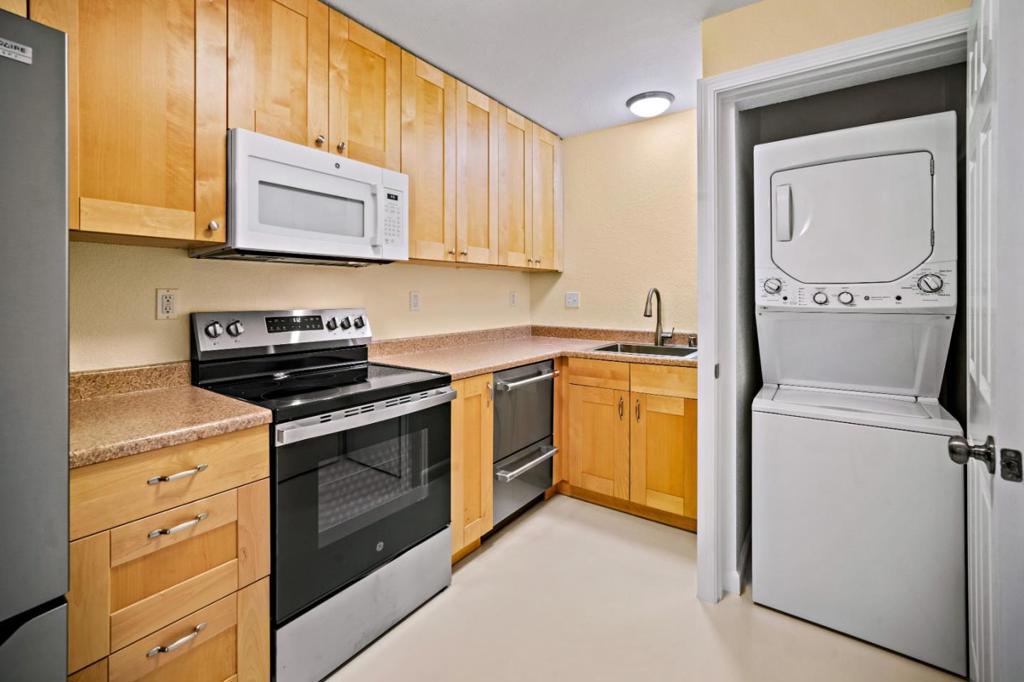 Welcome to this cozy updated ground level Condo that is truly move in ready. All New Appliances, Washer & Dryer, Refrigerator, Stove, Dishwasher, Water heater, Sink & water efficient Toilet. Fresh paint and well maintained unit that has direct access to the carport right outside the front patio. Grab bars in the shower add to the practical ease of use. The peaceful Cypress Park community is a welcoming & pet friendly complex. For those seeking more outside, HOA maintained BBQ & Pergola area adjacent the swimming pool to take full advantage of living in the sunbelt. Stepping out on a walk you have nearby gym, restaurants, grocery store and neighborhood parks. Or connect to the soon to be finished Fortag walking/biking trail expansion that will connect direct to the Monterey Bay Coastal Trail & pristine beaches. Extra gated parking for guests.