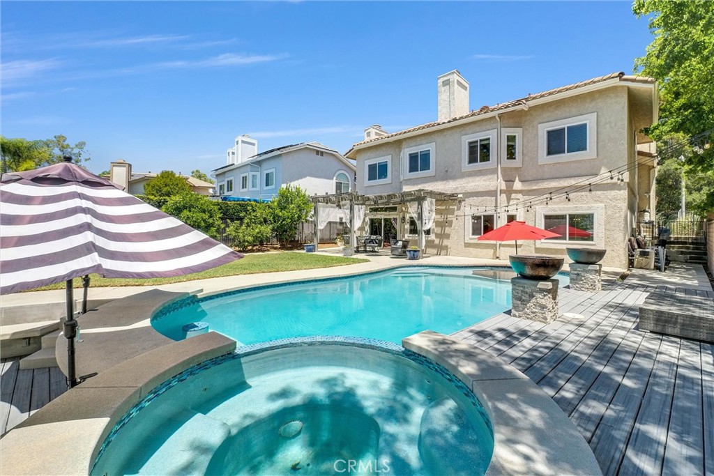 Tucked away on a quiet cul-de-sac in one of La Verne’s most desirable neighborhoods, 2698 Peacock Place offers the perfect blend of luxury, comfort, and location. This beautifully maintained 4-bedroom, 3-bath home spans 2,801 square feet and sits on a generous 9,729 square foot lot designed for both everyday living and unforgettable entertaining.
Step inside to find an inviting layout filled with natural light and thoughtful finishes throughout. The expansive master suite is a true retreat, complete with its own cozy fireplace, a soaking tub, a separate shower, and a spacious walk-in closet. The open-concept kitchen and family room create a seamless flow for hosting, while formal living and dining areas add a touch of elegance.
Outside, the backyard feels like a private resort. Enjoy a saltwater pool and spa surrounded by multiple entertaining spaces—perfect for summer BBQs, weekend gatherings, or relaxing evenings under the stars. The meticulously landscaped yard offers both beauty and privacy in a peaceful setting.
Located just minutes from charming Downtown La Verne, with its popular restaurants, boutiques, and community events, and with quick access to the 210 Freeway, this home combines quiet cul-de-sac living with unbeatable convenience. It’s also within walking distance to the scenic Marshall Canyon hiking trail and Marshall Canyon Golf Course, making it a perfect fit for outdoor enthusiasts. This is a rare find in an established, family-friendly community that continues to be one of the San Gabriel Valley’s best-kept secrets.