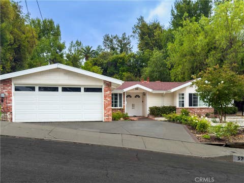Photo of 5708 Mcdonie Avenue, Woodland Hills, CA 91367 (MLS # SR26143233)