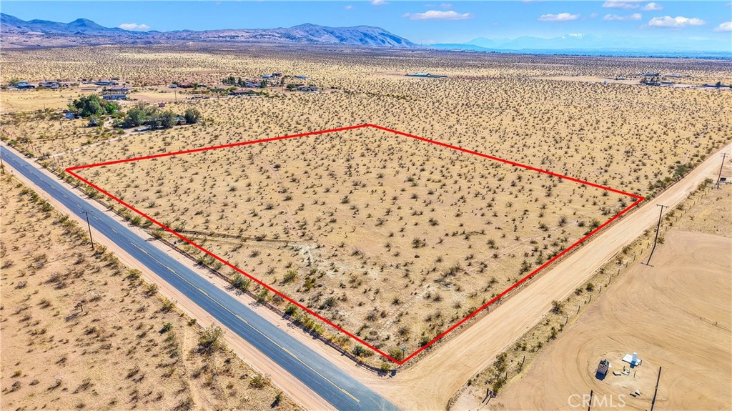 Endless Possibilities Await! This expansive 8.83-acre (±384,635 SqFt) level lot in Apple Valley offers the perfect canvas for your dream estate or future investment. Situated on a paved road in a quiet and peaceful setting surrounded by custom homes, this parcel combines privacy with convenience. Enjoy easy access to Highway 18 and just 30 minutes from Big Bear. Minutes away from multiple schools, restaurants and surrounded by wide open desert making it an ideal location for year-round living or vacation retreat development. With ample space and scenic desert views, this is your opportunity to own a rare large parcel in a prime Apple Valley location.