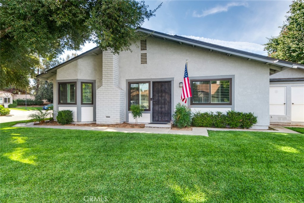 Welcome to Barclay Square, a Beautiful Gated Community where this Single-Story Corner Lot in a Cul-De-Sac home has been Completely Upgraded and Lovingly Maintained. Mature Trees Provide Wonderful Shade in Both the Front and Back Yards, Creating a Private and Inviting Setting. The Porcelain Wood-Look Tile Throughout, a Remodeled Kitchen with Custom Cabinets, Granite Countertops and Stainless Steel Dishwasher, Oven/Cooktop, Microwave and Counter Depth Refrigerator are just a Few of the Upgrades. The Kitchen has an Eating Area with a Fandelier and Shutters and Opens to the Living Room. The Living Room is Cozy with a Gas Fireplace. The Hall Bathroom has a Vanity with Storage and a Tub/Shower Combo. Bedrooms 1 and 2 Feature Ceiling Fans, Shutters and Mirrored Closet Doors. The Primary Bedroom is Good Sized with the Primary Bathroom Attached that has a Custom Sized Shower, Dual Sinks, Vanity with an Abundance of Storage and Mirrored Closet Doors. The Sliding Door to the Back Patio Area has Great Afternoon Shade from Mature Trees and is Easy to Enjoy. The Air Conditioner is Daikin, there is a Nest Thermostat and the House has a Puragain Water Filtration System. The Garage has a LiftMaster Garage Door Opener and Built in Storage and Space for the Washer and Dryer. The HOA Maintains the Front Yard. This Home Truly Checks all the Boxes so Call and Schedule Your Private Showing Today!