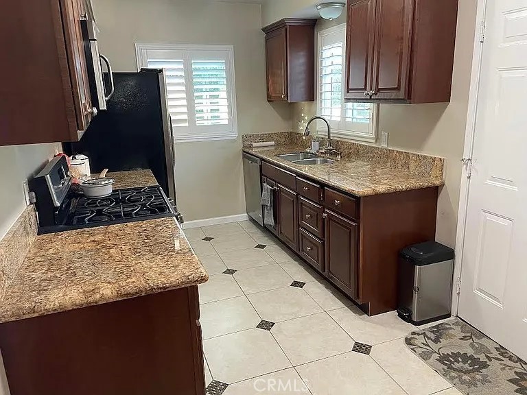 ***WOW!! Very nicely upgraded and maintained, 3 bedroom, 2 bath home. Elegantly remodeled. Engineered wood flooring. Gourmet kitchen with granite countertops, walk in pantry, breakfast nook/peninsula. Bathrooms have been upgraded with new flooring, vanities and fixtures. Great size yard. 2 car attached garage with plenty of storage and work space. Includes washer and dryer, and fridge. Very nice family oriented, residential neighborhood and conveniently located near all amenities and shopping. A must see and is available now! Call or text Dr. Anne for a showing appointment.