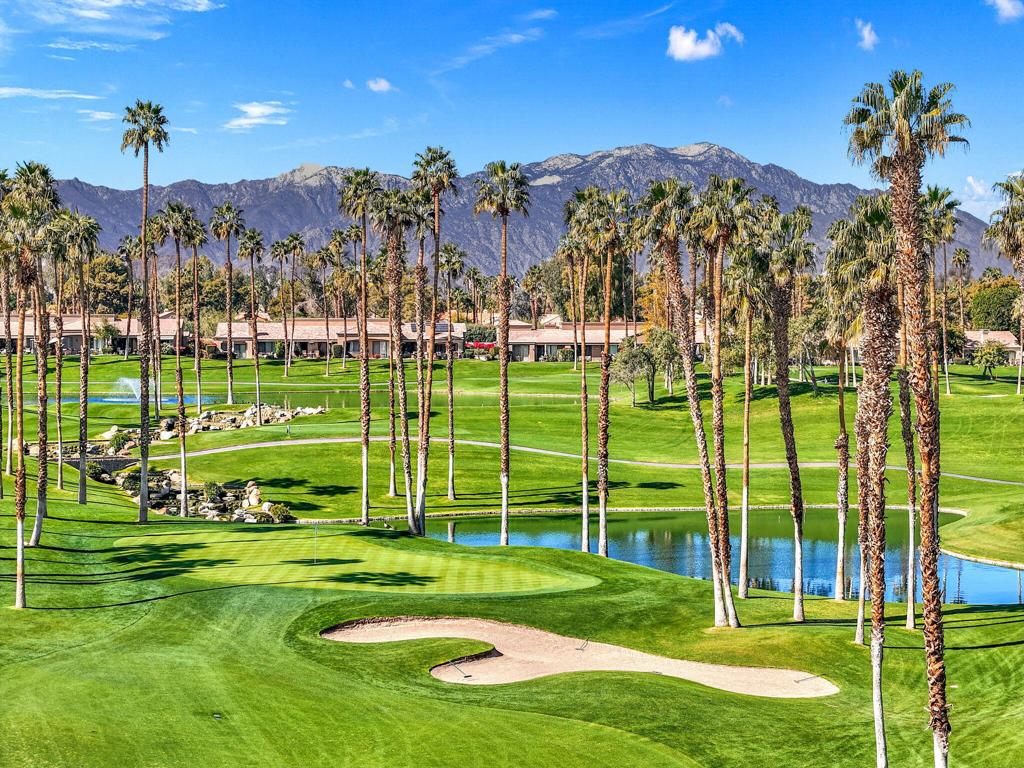 Experience the perfect blend of comfort, style, and privacy in this enchanting Palm plan, ideally situated on a peaceful internal street within the sought-after Palm Valley Country Club. Nestled away on the side of the community farthest from the freeway and train, this location offers a serene setting with added tranquility and a true neighborhood feel. Positioned along the 7th hole tee box of the Championship course, the home boasts stunning southern views of the mountains and swaying palms, all bathed in golden desert sunlight. Inside, you'll find two spacious ensuite bedrooms within 1,549 square feet, plus a flexible morning room--perfect for a stylish office, cozy den, or third sleeping area. Step outside to a welcoming patio, ideal for sipping morning coffee or enjoying sunset cocktails with friends. Just steps away from a sparkling community pool and offered fully furnished, this home invites you to settle into the relaxed luxury of the 'fun club' lifestyle. Monthly HOA dues include social membership, cable, internet, trash, roof maintenance, exterior painting, and 24-hour guarded gate and security patrol. Schedule your private tour today!