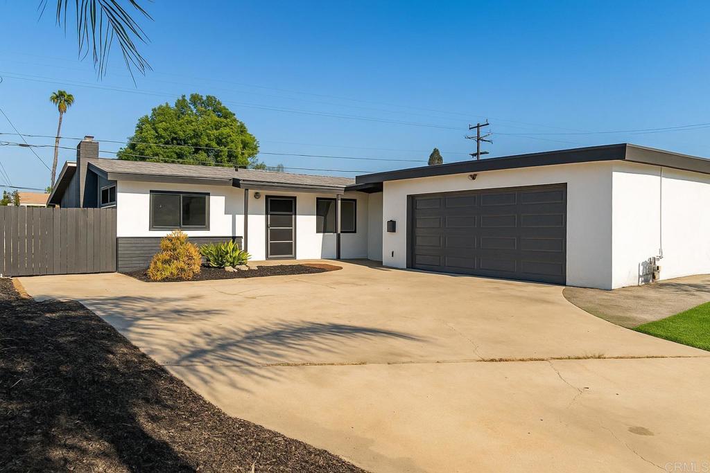 The One You've Been Waiting For - Fully Remodeled & Move-In Ready! From the moment you arrive, this beautifully reimagined 3-bedroom, 2-bath home stands out with fresh curb appeal, new turf, and modern upgrades throughout. Step inside and experience a space that’s been completely transformed for style, comfort, and everyday living. You'll love the brand new kitchen, complete with sleek quartz countertops, an oversized island perfect for entertaining, stainless steel appliances, and stylish cabinetry. The open-concept layout flows seamlessly over the new LPV flooring, freshly painted walls, and brand-new bathrooms with modern finishes. Need extra space? A bonus room offers flexibility for laundry with hookups, storage, or your next creative project. Plus, the detached garage is packed with potential—perfect for a home office, gym, or future ADU conversion. With new landscaping front and back, room to play, and a location near schools, parks, and highways—this home truly has it all. Don’t miss your chance to own this fully upgraded home in a prime location!