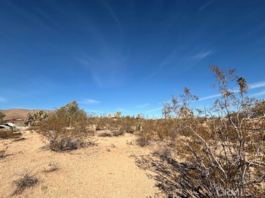 Build your dream home on this beautiful 1.25-acre parcel in Yucca Valley! Enjoy breathtaking mountain and city views from your own private retreat. Peaceful desert surroundings with plenty of space for your custom home, garden, or weekend getaway. Conveniently located near town yet offers the perfect balance of tranquility and open space.