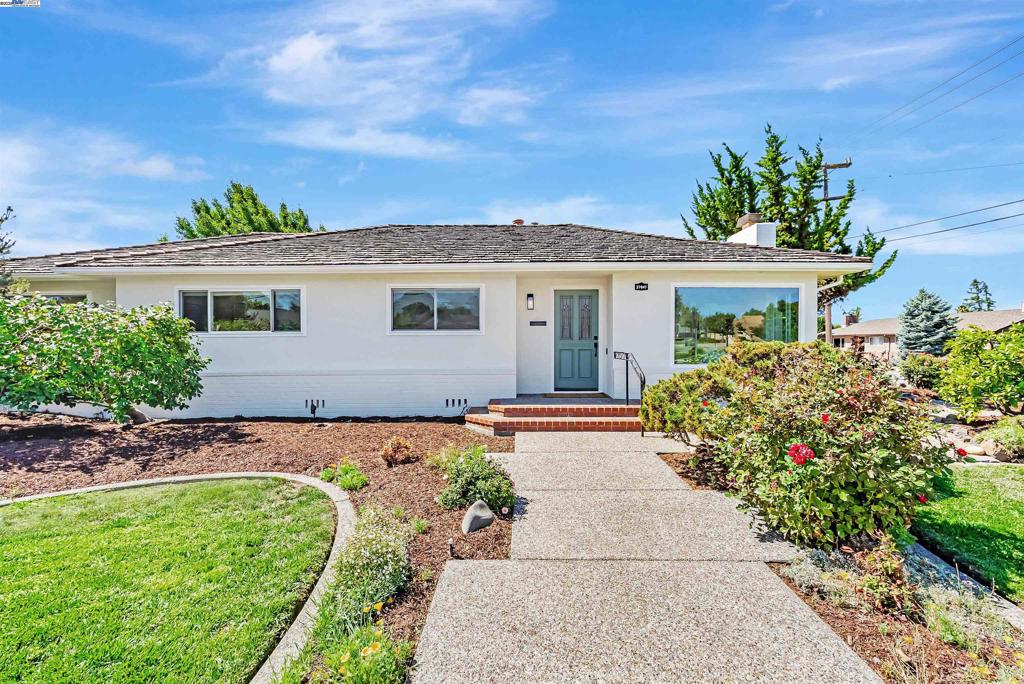 Located in the sought-after Glenmoor neighborhood, this single-story home offers timeless charm, thoughtful updates and a flexible floor plan. Step inside to find a customized single-level layout that flows seamlessly from room to room while natural light highlights the spacious living areas. Beautifully updated kitchen offers custom cabinetry, granite countertops, subway tile backsplash and stainless steel appliances including a gas stove. Additional features include central AC, owned solar panels, freshly painted interiors & exteriors, updated bathrooms, newly installed waterproof laminate flooring and dual pane windows. The yards are adorned with mature citrus trees, a pear tree and an olive tree that add shade and character. Whether you envision summer barbecues, gardening or quiet evenings under the stars, the yard offers endless possibilities. Plus, RV side access adds versatility to your outdoor space. Nestled within Glenmoor, residents can enjoy access to community pools, tennis courts, playgrounds, and parks. Nearby excellent schools, dining and easy commuter routes including the 880, Dumbarton Bridge, Centerville Station and BART. With its combination of classic appeal, fresh updates & charming community, this house is a wonderful opportunity to make Glenmoor your home!