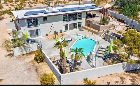 Photo of 73633 Desert Trail Drive, 29 Palms, CA 92277 (MLS # 219143587PS)
