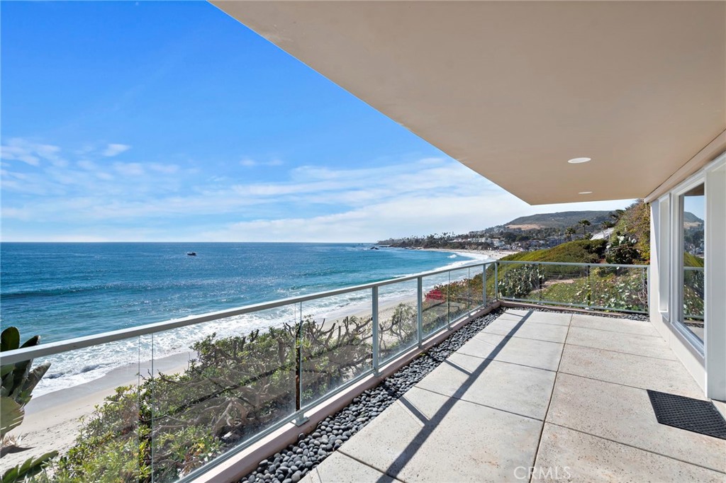 Experience the ultimate in coastal living with this fully furnished oceanfront studio, perfectly located in the heart of Laguna Village. This charming lower-level unit offers unobstructed, breathtaking ocean views and direct access to the sand via private steps just outside your front door. Designed for comfort and convenience, the studio features a full kitchen, a beautifully upgraded bathroom, and a private ocean-view patio—ideal for enjoying sunsets and sea breezes. Whether you're seeking a serene seaside retreat or a vibrant beachside lifestyle, this location has it all. Stroll to Laguna’s finest restaurants, boutique shops, and renowned art galleries, or hop on the nearby trolley to explore the town. With its unbeatable setting and thoughtful amenities, this oceanfront gem is truly a rare find.