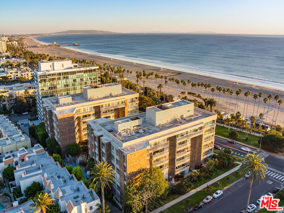 Anticipated to be available in mid to late March due to ongoing construction in the residence and building. Ocean Avenue penthouse with stunning ocean and mountain views. Located in the prestigious Park Plaza building, this condominium features two bedrooms, four bathrooms, and a bonus room that could be used as a gym or home office. This sunlit residence boasts wood floors, floor-to-ceiling sliding doors, a private laundry room, and custom built-ins. The large, open chef's kitchen with stainless steel appliances, wet bar, dining room, and living room provides the perfect opportunity to entertain. Multiple sliding doors lead to a wrap-around balcony that embodies the California lifestyle. Building amenities include a 24-hour concierge, security, pool, spa, fitness facility, and conference room. Conveniently located near Santa Monica dining, shopping, and Palisades Park.