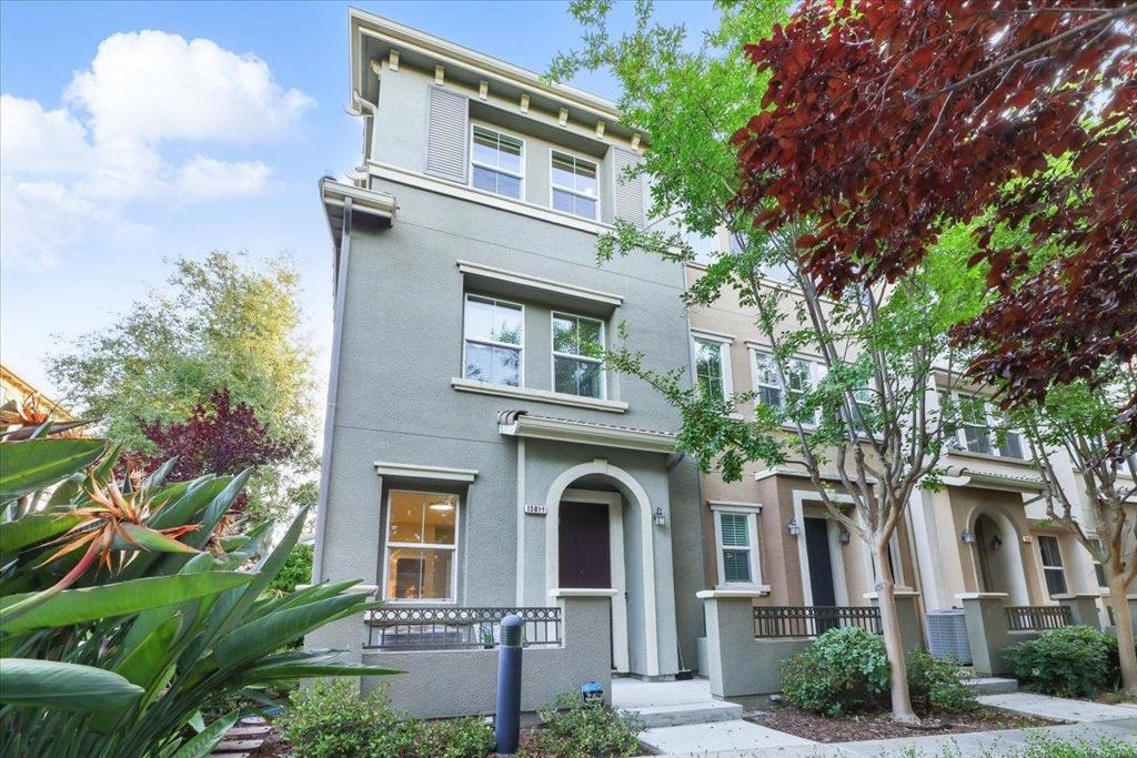 Welcome to this delightful end-unit townhome nestled in the highly sought-after Toscana community at Rivermark in Santa Clara! This spacious 4BD/4BA home offers an ideal blend of functionality and luxury. The ground level features a private bedroom with a full bath, perfect for guests or extended family. The open-concept second floor is designed for seamless entertaining, showcasing a gourmet kitchen with custom cabinetry, stainless steel appliances, modern finishes, and a large central island. A cozy living and dining area invites connection, while a full bedroom and bathroom on this level provide added flexibility for an office or guest room. Upstairs, you'll find two generous suites, including a primary suite with a walk-in closet, dual vanities, an upgraded stall shower, and a soaking tub. The junior suite is filled with natural light and offers ample space. Additional features include central HVAC, a side-by-side 2-car garage, upgraded flooring, and designer light fixtures. Minutes to Rivermark Plaza, Mercado, Agnew and Live Oak Parks, and Levis Stadium. Close to major tech firms like Oracle, Intel, Cisco, and other leading Silicon Valley companies with easy access to 101, 880, and 237. Low HOA dues. Come experience the charm and comfort of this exceptional home!