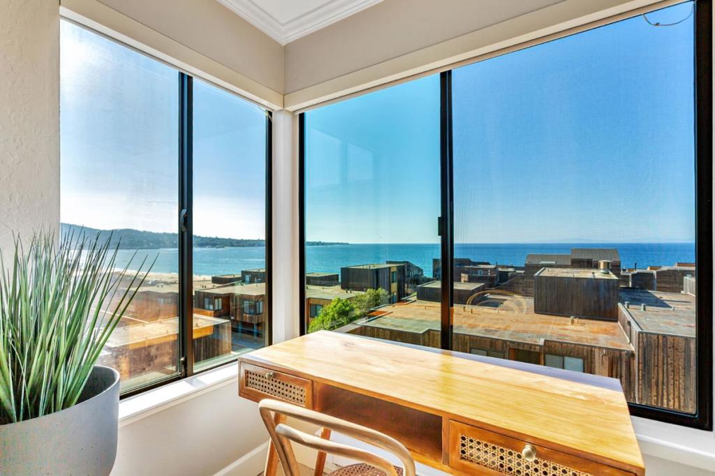 Looking for a special place that makes everyday feel like you are on vacation, look no further, this jewel is offering breathtaking views of the ocean, dunes, and city lights. This gem is just steps away from the sandy shores, where you can indulge walks on the beach or whale watching right from your living room or master bedroom. A rare 3 bedroom townhome, featuring 2 master suites on 2 levels and 2 balconies located in the prestigious Ocean Harbor House complex, with direct access to the beach. Main features include remodeled kitchen and bathrooms, fireplace, remote controlled privacy screens,water filter in the kitchen, Mysa smart thermostat remotely controlled, inside laundry, garage, extra parking spot and extra storage that makes this property perfect for full time living or part-time beach home. This townhouse comes fully furnished. Relax and watch the ever-changing sea, take a walk on the beach or take a ride on the bike path nearby. Located in a secure, gated community, residents enjoy a resort-style lifestyle with amenities including 2 heated pools, spas, a sauna, fitness center, and game rooms. Whether you're seeking a full-time retreat or a weekend escape, this is the beachside sanctuary you've been dreaming of.