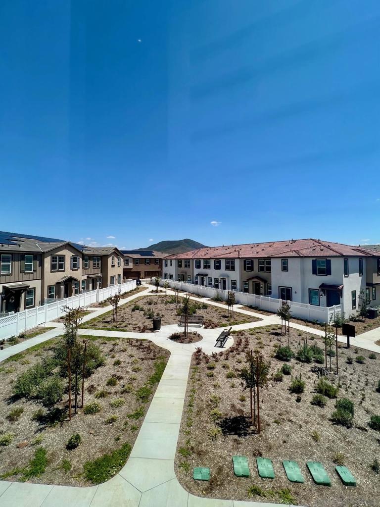 Welcome to your dream home! Step into this stunning newly built 2024 townhome, perfectly combining modern style, convenience, and sustainability. Featuring 3 spacious bedrooms and 2.5 elegant bathrooms, this immaculate, turn-key residence is ready for you to move right in.This townhome is centrally located in complex near pool/club house & mailboxes and no front facing neighbors. This home has whole house water filtration system/softener, reverse osmosis water system in kitchen, plantation shutters on all windows, garage storage racks, game room/office with electrical, AC, and separate entrance, ceiling fans, barn door in master, hard wire (Ethernet ready) from internet panel to guest room, TV mounting system/cable hiders in guest room, tankless water heater, 240 V EV Charger installed and Leased Solar + battery backup (nem 3.0) Every detail of this home has been thoughtfully designed to deliver a modern, low-maintenance lifestyle in a highly desirable location. The brand-new community will feature onsite amenities such as, recreation center, walking trails, pool and spa, and so much more for you and your family to enjoy! Plus, an amazing sports park is just across the street from this unit — perfect for outdoor fun and activities! Don't miss this rare opportunity to own a stylish, energy-efficient condo packed with upgrades and situated in a vibrant, up-and-coming neighborhood. Temecula Valley Unified School District