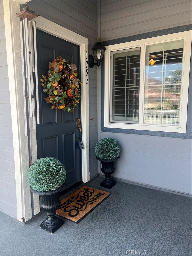 Welcome Home! Don't miss out on this Cozy Home that is located in the Crystal Canyon Community. This Wonderful Home has 2 Bedroom 2 Bathroom plus Den / Potential 3rd Bedroom. Upstairs end unit with Balcony access from the Living room and Den. Upgraded Kitchen with Granite counter tops and newer cabinets. Laminate flooring and carpet throughout. Shutters on all the Windows with a newly remodeled Hallway bathroom. New furnace and updated sprinklers in the unit. This Unit offers 2 Single car garages side by side the only one in the Complex! Amenities include Tennis Courts and Pool. Biking trails and Metro Line Near by along with APU and Citrus College. Easy access to the 210 Freeway.