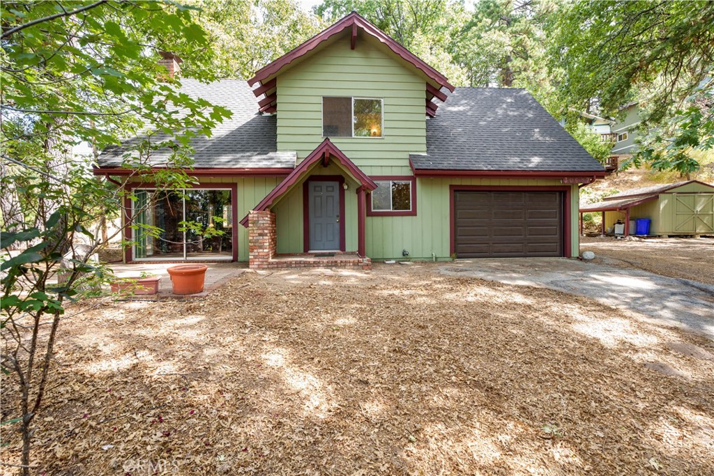 Charming Mountain Cabin on Expansive Corner Lot with Unique Features
Welcome to your perfect mountain escape! Nestled on a spacious 15,200 sq ft corner lot, this 1,179 sq ft cabin offers privacy, charm, and exceptional functionality in a peaceful, sought-after neighborhood. Step inside to a warm and inviting living room with soaring 22-foot knotty pine ceilings and a cozy wood-burning stove insert—ideal for those chilly mountain evenings. The main floor also features a kitchen equipped with a brand-new stovetop and built-in oven, plus a convenient half bath. Upstairs, you'll find a versatile office/bonus area, a full bathroom, and two uniquely designed bedrooms—one boasting dramatic vaulted ceilings and the other featuring a custom mountain climbing gym perfect for the adventurous spirit. Outside, enjoy abundant off-street parking, including dedicated RV parking, and a 1-car attached garage with a newer 12-foot door, exhaust fan, compressor, welder, and 220V hookup—perfect for hobbyists or gearheads. Additional amenities include laundry hookups and an insulated, Alaskan-style doghouse with direct access to the home. With a well-maintained 12-year-old roof featuring extra padding, and surrounded by tranquility, this cabin blends rustic character with practical upgrades. Whether you're looking for a full-time home or a weekend retreat, this unique property offers it all.