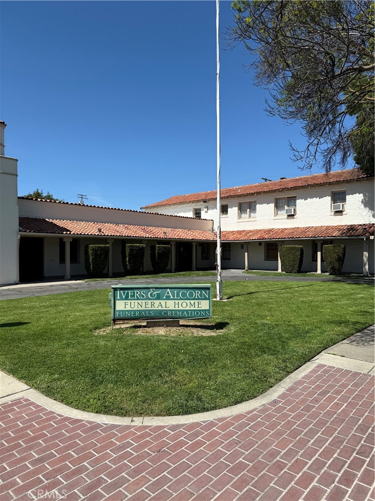 Unique commercial opportunity in the heart of Merced. The Ivers and Alcorn Funeral Home, located on Main Street, is situated on two parcels and has exceptional versatility. The main building features a large chapel area, private offices, upstairs living quarters, a partial basement, and a spacious garage with an attached warehouse area. The third parcel, located directly across the street, provides approximately 15,000 square feet of off-street parking. This property is well-suited for continued use as a funeral home or can be repurposed for a church, school, event center, or community gathering space (buyer to verify permitted uses with city). Don’t miss this rare opportunity to own a prominent corner location with ample space, visibility, and potential.