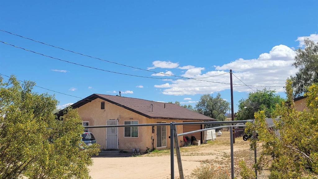Two single family units on property on a large lot - each unit is a 1 bedroom and 1 bath. One unit features a 2-car garage. Live in one unit, rent the other for income.