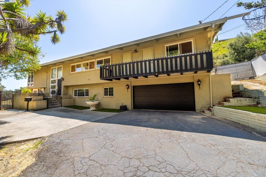 Welcome to this 5-bedroom, 4-bathroom home offering 2,600 sq ft of thoughtfully designed living space on a sprawling 23,309 sq ft lot, with plans in place to build an additional 3,500 sq ft home. Inside, you’ll find hardwood floors throughout, recessed lighting, and abundant natural light that keeps every room bright and welcoming. The home features a cozy family room with a fireplace, perfect for relaxing evenings, and a bright living room ideal for gatherings. Downstairs offers 2 bedrooms, 2 bathrooms, and a kitchenette, ideal for guests, in-laws, or flexible work-from-home options. Step outside to your low-maintenance backyard, ready for gardening, outdoor dining, or simply soaking in the views. An attached 2-car garage provides ample storage and workspace, while central heating and a whole house fan keep you comfortable year-round. Located within the Proctor school district, this home is a gem you’ll be proud to call your own.