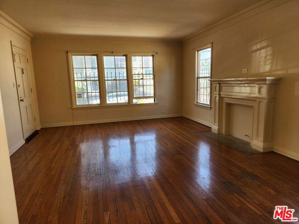 Amazing opportunity to live in a centrally located and oversized unit in secure building located near Koreatown. Large living room, dining room, hallway leads to full bathroom with separate tub and shower and bedroom. Amazing closet space. Hardwood floors throughout. Includes garage in gated area. Laundry room on site.