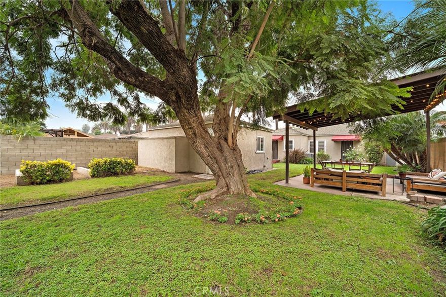 Experience timeless Long Beach living in this inviting single level home situated on a generous 6,211 square foot lot in the sought-after Wrigley District. The palm tree-lined street captures the essence of the coastal lifestyle, offering both character and convenience in one of the city’s most established neighborhoods. This 3 bedroom, 1 bathroom residence features approximately 1,245 square feet of living space and exudes warmth through its classic design and welcoming atmosphere. The open and airy layout offers comfortable living areas filled with natural light, perfect for everyday enjoyment or relaxed entertaining. The expansive backyard provides endless potential—whether for outdoor gatherings, gardening, or future expansion. Parking is more than ample, with a detached two car garage and driveway space for up to four additional vehicles. Ideally located near Long Beach’s best attractions, including local beaches, the Aquarium of the Pacific, Shoreline Village, the Queen Mary, and the Long Beach Convention Center, this home also offers easy access to shopping, dining, and transportation. Combining character, location, and lifestyle, this Wrigley District gem embodies the best of coastal Southern California living.