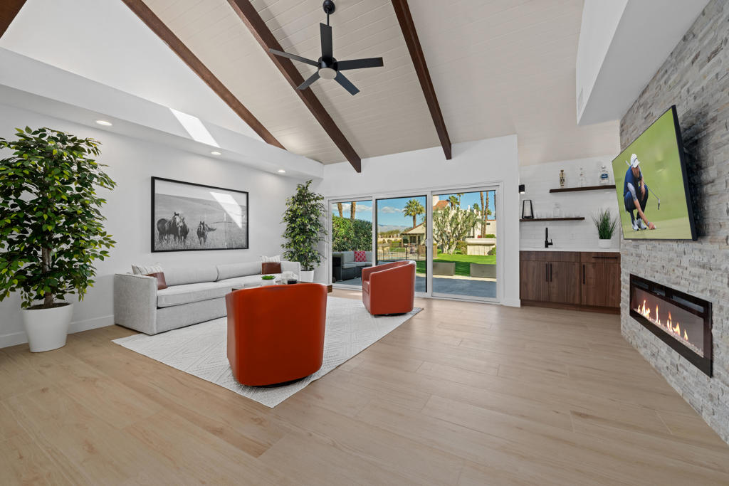 This Spectacular 2-bedroom plus office/den, 2-bathroom retreat in Mission Hills Country Club has undergone a stunning modernization, featuring a range of designer upgrades. From the open kitchen with quartz counters and high-end appliances to the spacious great room with impressive features like an electric fireplace and wet bar, this property offers a luxurious living experience. The primary bedroom with its redesigned spa bathroom and ample closet space is sure to provide a comfortable retreat. Including furnishings, TVs, and artwork could make it a turnkey solution for enjoying the country club lifestyle. If you're considering this property, it's worth exploring further to see if it meets all your needs and preferences. Long Term Lease.