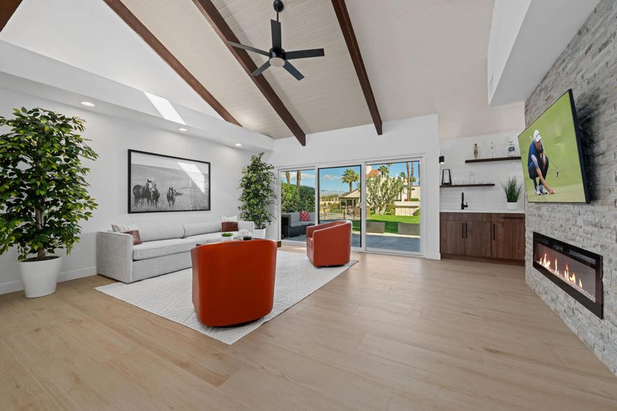 This Spectacular 2-bedroom plus office/den, 2-bathroom retreat in Mission Hills Country Club has undergone a stunning modernization, featuring a range of designer upgrades. From the open kitchen with quartz counters and high-end appliances to the spacious great room with impressive features like an electric fireplace and wet bar, this property offers a luxurious living experience. The primary bedroom with its redesigned spa bathroom and ample closet space is sure to provide a comfortable retreat. Including furnishings, TVs, and artwork could make it a turnkey solution for enjoying the country club lifestyle. If you're considering this property, it's worth exploring further to see if it meets all your needs and preferences. Long Term Lease.