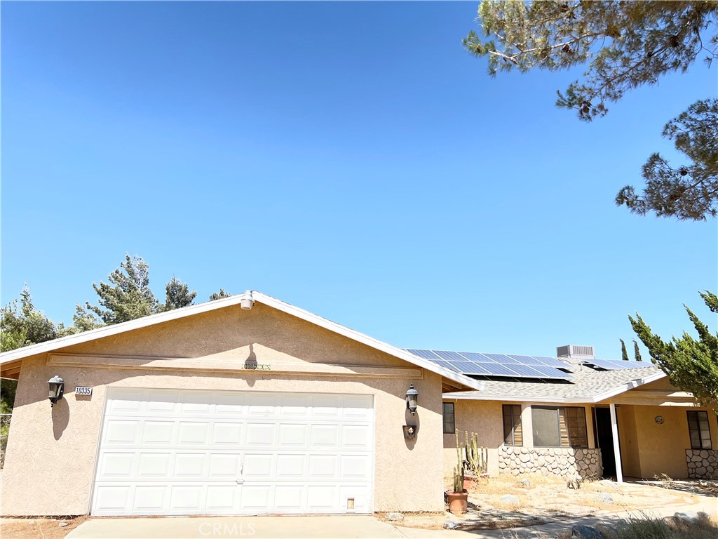 Highly Desired location in Oak Hills. Well kept custom built home on 2+ acres lot. Fenced surrounded. Feature 6 bedrooms and 3 bathrooms. Large master suit with walk-in-Closet. Good size bedrooms. Open kitchen to dining area. Bright and airy living room with fireplace. Parallel gated lot belongs to subject property potential to build your dream home. Need to check with city. PAID OFF solar system. Vaulted Ceilings, laundry room, central vacuum, central air and heat. Plenty of room for RV parking. Close to school, gas station, Highway 395, and Freeway 15.