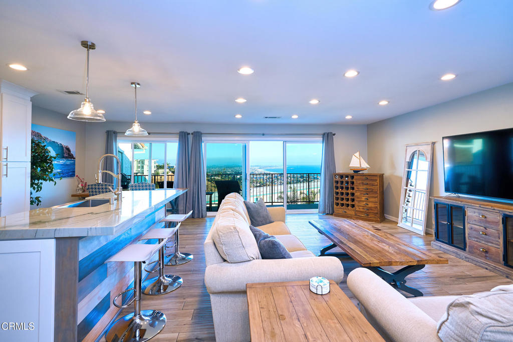 Experience turnkey coastal living in this beautifully furnished Ventura hillside condo, also available unfurnished if preferred. Bathed in natural light, this home showcases walls of glass framing sweeping ocean views, including the historic Ventura Pier, visible from nearly every window. The open-concept living area flows seamlessly to a private balcony, perfect for morning coffee or evening sunsets. The kitchen is appointed with quartzite countertops, stainless steel appliances, and generous storage, balancing style and function. The serene primary suite features panoramic windows that capture beautiful sunrises and sparkling city lights. Washer and dryer are included in-unitThis quiet and relaxing complex offers a true retreat while keeping you close to everything. Downtown Ventura, the botanical gardens, and the Saturday farmers market are all just minutes away. Community amenities include a sparkling pool, spa and guest parking. The HOA maintains the community beautifully. Water and trash are provided; tenant pays electric, gas, and internet.Additional highlights include an attached 2-car garage, flexible furnishing options (fully or partially furnished), and thoughtful design throughout. Perfectly located minutes from Ventura's beaches and scenic trails. Walking distance to downtown, this home blends privacy, comfort, and convenience. Ideal as a full-time residence, work-from-home retreat, or luxury getaway, move-in ready, this is the Ventura lifestyle at its best. Shown by appointment only. Please allow a minimum of 4 hours' notice. Text or call agent to schedule with your requested date and time. Suzie Connell 805-216-5695