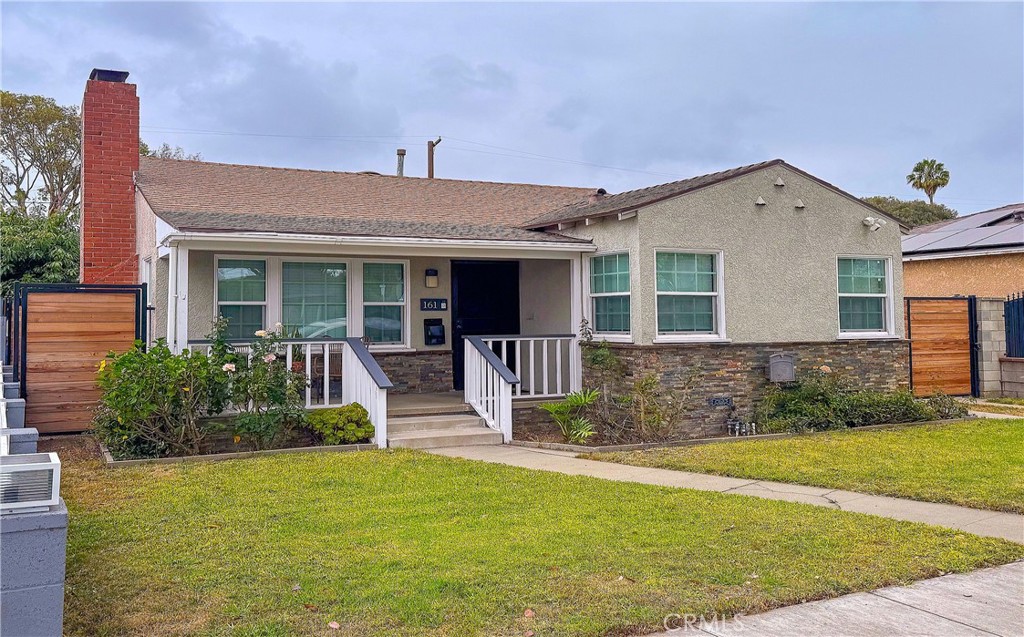 Curb Appeal Cuteness to Spare! This Beautifully Maintained 2 Bedroom, 2 Bath Home, Nestled on a Tranquil Tree-Shaded Street, is Coolidge Triangle of North Long Beach at its Finest! Enter over the Well-Appointed Front Porch, Just Begging You to Sit and Enjoy Your Quiet Morning Coffee! Step Inside To The Blissful Ambience of a Pastel Paint Palette and Rooms Flooded with Natural Light! The Living Room Offers a Feature Fireplace, Recessed Lighting, Ceiling Fan and Room to Move! Retro Charm, with Modern Conveniences like Whisper-Quiet, Wi-Fi Enabled Window A/C Units! A Separate Dining Room, with Windows in Every Direction to Add Atmosphere Morning, Noon, and Night to any Family or Intimate Gathering! Updated Farm-House-Style Kitchen with Stainless Appliances, Granite Counters, Cabinetry to Spare, and Open Butler’s Shelving, plus Convenient Inside Laundry Area! The Primary Suite has been Totally Reimagined, with its Own En-Suite Luxurious Bathroom and HUGE Cedar-Lined Walk-In Closet. The Secondary Hallway Full Bathroom has been Completely Remodeled, with Attractive Subway Tiles on the walls and Over-Sized Slate-Style Floor Tiles adding Accent to the Handsome Vanity. Bedroom Two offers an Over-Sized Slider to access the Entertainers Dream Back Yard, with Tasteful Deck, Built-In Bar Top to Enjoy Family BBQ’s, Retractable Awning for Shade and Fruit Trees just because. Enjoy the Convenience of a Detached 2-car Garage and Enough Off-Street Parking for Several Cars and Even the Family RV! The Driveway Privacy is Guarded by a Powered Gate, and for Extra Convenience there is a Full-Sized Vehicle Access via the Gate at the Rear. The Size of this Lot and Position of the Garage Building Provide an Excellent Opportunity to Explore ADU Possibilities and More! Tankless Water Heater, Classic Wooden Blinds Throughout! With Close Proximity to Schools, Shopping, DeForest Park and Multiple Dining Options, plus Easy Access to Major Freeways (710, 91 & 405), This Home Has Everything You’re Looking For and More. What Are You Waiting For? Start Your Story Here!