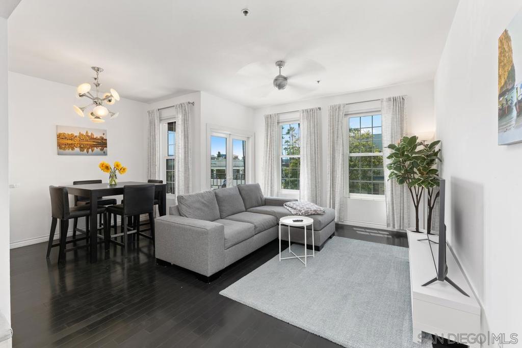 Rare private top floor condo in desirable Uptown District in the heart of Hillcrest. This highly upgraded two bedroom two bath unit features a designer kitchen with chic custom cabinetry, marble countertops and stainless appliances. Spa like bathrooms with Zuma soaking tub, custom vanities and tumbled marble showers. Plenty of natural light fills this west facing unit. Enjoy your morning coffee on one of the two private balconies overlooking the urban cityscape. Ample closet space and in-unit stacked Bosch washer/dryer, new Milgard windows and french doors and maple hardwood floors throughout. The gated community offers resort-style amenities including underground parking (two deeded spaces-not tandem, one with an EV charging station), pool, spa, gym, BBQ area, dog park and beautifully maintained grounds, all just steps away from Trader Joe’s, Ralphs, cafes, shops, and restaurants. Priced to sell, don’t miss this chance to get into Hillcrest and make it your own!