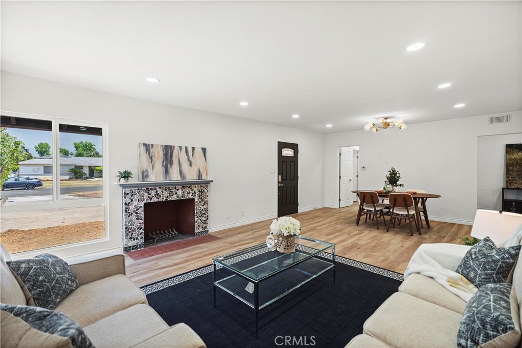 Stunning Turnkey Home in Mission Hills! This thoughtfully upgraded home features a formal living room with a cozy fireplace, a separate family room for added comfort, and a modern open-concept kitchen designed to impress. The kitchen has been completely renovated with sleek stainless steel appliances, an oversized island perfect for meal prep or casual dining, and abundant cabinetry for all your storage needs — ideal for both entertaining and everyday living.
Enjoy year-round comfort with a brand-new 4-ton central air conditioning system, new ductwork, fresh plumbing, updated windows, and new roof paint. Inside, the home boasts water-proof flooring, fresh interior and exterior paint, and tastefully remodeled bathrooms with contemporary finishes.
Step outside to find newly landscaped front and backyards, providing a tranquil setting for outdoor gatherings or relaxing at home. The attached two-car garage adds convenience and additional storage.