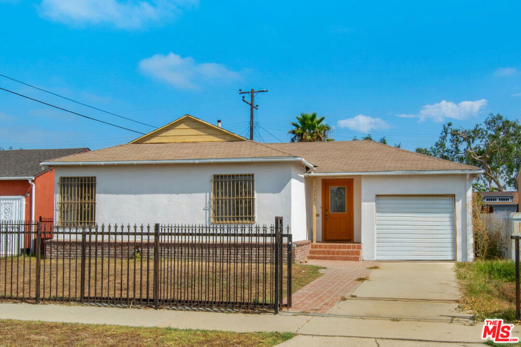 OFFER DEADLINE WEDNESDAY 9/10/2025 AT 12:00 NOON. An outstanding price - a great starter home - don't miss 1713 W Claude St, a charming single-story home nestled on a neat little residential neighborhood south of the Compton/Woodley airport and near lots of newer residential and commercial retail developments. Easily access from the 105 freeway and centrally located in this "Hub City" that offers easy access to major freeways including the 91, 105, and 710 Freeways while at the same time providing residential neighborhoods and a strong sense of community. Built in 1949, this cozy 2- bedroom, 1-bathroom residence offers 796 sq. ft. of living space on an expansive 5,748 sq. ft. lot. Step inside to a bright and inviting living area featuring a large picture window overlooking the backyard, filling the home with natural light. The layout flows seamlessly into the kitchen, which provides direct access to the extra large backyard - great for enjoying or maybe expanding the house or adding an accessory dwelling unit. Fruit trees offer shade and homegrown fruit, while the generous lot allows plenty of space for gardening, outdoor dining, or creating your dream retreat. With both side yard and kitchen access to the backyard, this home is designed for convenience and indoor-outdoor living. The front yard is gated, spacious, and well-maintained, proving added privacy and security. The front yard is large enough to create your own flower or vegetable garden to complement the backyard space.Located on a quiet residential street, this home is just minutes from schools, shopping, and freeway access. With a walkability score of 78, daily errands are a breeze.Whether you're a first-time buyer, downsizing, or looking for an investment, 1713 W Claude St combines charm, functionality, and endless potential.
