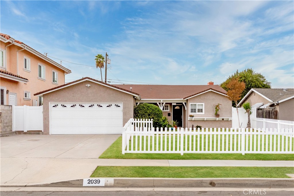 Welcome to your new and beautiful home in the awesome city of Rowland Heights. Within the 5,754 square foot lot sits an incredible home graced with 1,319 square feet of glorious single story living space with 4 generously sized bedrooms and 2 bathrooms. Inviting you in from the wide driveway, the front yard offers lovely curb appeal with green grass, mature trees and landscape & a white fence embracing the front yard. The front porch offers a seating area with great views of the neighborhood. You will enjoy this home for many years to come. As you step into the home, you will be greeted by a large living room with a fireplace for those chilly nights, newer laminate flooring and a slider opening to the covered patio and backyard. The kitchen has been newly remodeled with beautiful ceramic tile flooring, a farmhouse sink and window overlooking the front yard and neighborhood, cabinets with soft close doors and drawers. The kitchen eating area window and dining area window have Plantation shutters. The kitchen is very generously equipped with: pendant lighting, stainless steel appliances such as: a 5 burner gas stove & oven, ss hood, ss dishwasher, ss refrigerator. The built-in microwave oven is located just above your coffee bar which is beautified with a granite counter top and subway tile backsplash. Enjoy eating casual meals at your countertop bar seating area. For your convenience, the washer and dryer are located in the kitchen along with shelving for storing your household necessities just behind the bi fold doors. The guest bathroom is simply stunning as it has been remodeled with a marble sink and countertop, new vanity, ceramic tile flooring, stunning shower, new faucets & toilet, and recessed lighting.
All 4 of the bedrooms have newer carpet & ceiling fans. The backyard has a covered patio and a green grassy area for the kids to play. A chain link dog run is perfect for your fur baby! This home has many great features such as: Doubled pane windows, barn door closets, Pex plumbing & copper plumbing, security system with lighting, beautiful city and mountain views, top rated schools, shopping centers and so much more! Come see for yourself! This home has so much to offer and it won't last long! Do not miss this opportunity to own this gem!!!