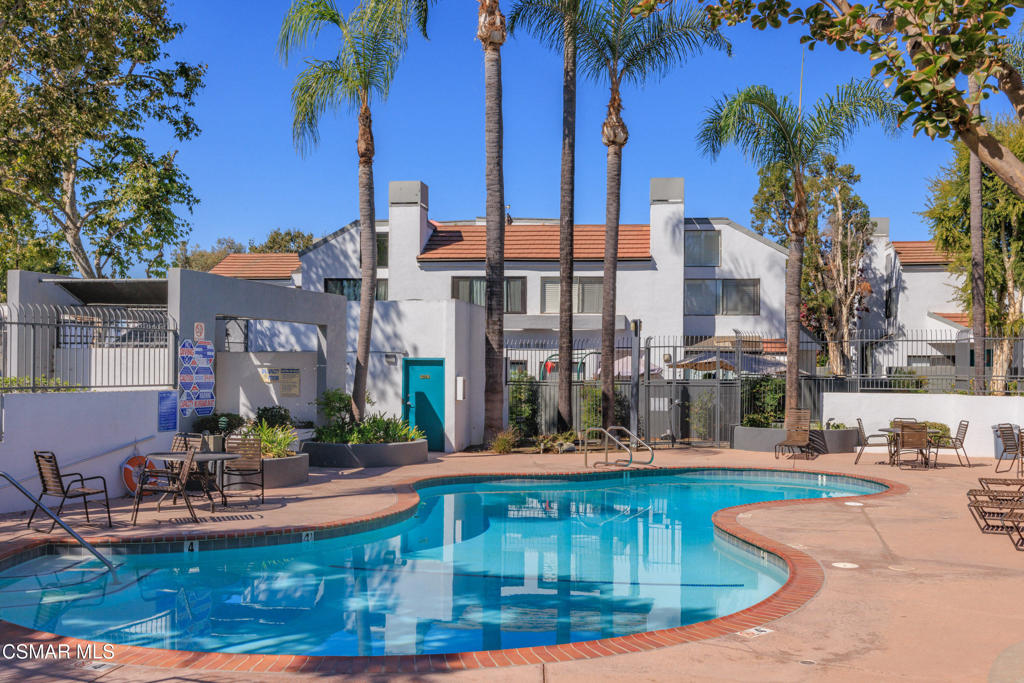 Welcome to this beautifully upgraded 2-bedroom, 2.5-bath townhome in the desirable Le Parc community of Simi Valley. This light and bright 1,164 sq. ft. home features an inviting open living room with recessed lighting, a striking stack stone fireplace, and an adjoining dining area. The kitchen offers a breakfast bar, tile countertops, and ample storage, with an indoor laundry room conveniently located nearby. Step outside to enjoy the tranquil, freshly manicured private backyard--perfect for relaxing or entertaining.Upstairs, you'll find two spacious bedrooms with vaulted ceilings, each with its own private bathroom. Brand-new carpeting, fresh interior paint, and high efficiency windows create a move-in ready feel. Additional highlights include laminate flooring downstairs, a convenient half bath, central AC, and a private 2-car garage.The Le Parc community offers resort-style living with two sparkling pool areas, and the location provides some of the best sunset views with easy access to the 118 freeway, shopping, dining, and more. A wonderful opportunity to enjoy comfort, convenience, and style in West Simi Valley!