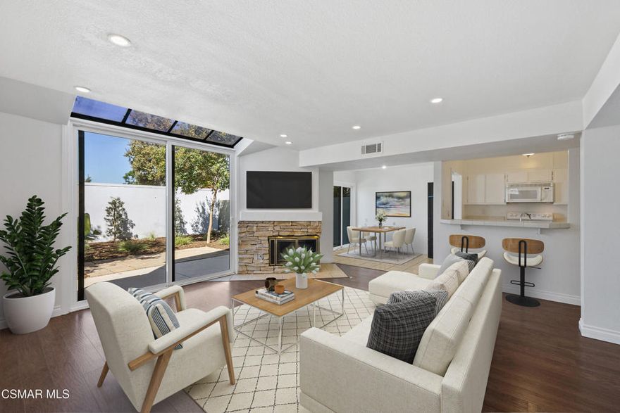 $5000.00 closing cost credit!! Welcome to this beautifully upgraded 2-bedroom, 2.5-bath townhome in the desirable Le Parc community of Simi Valley. This light and bright 1,164 sq. ft. home  features an inviting open living room with recessed lighting, a striking stack stone fireplace, and an adjoining dining area. The kitchen offers a breakfast bar, tile countertops, and ample storage, with an indoor laundry room conveniently located nearby. Step outside to enjoy the tranquil, freshly manicured private backyard--perfect for relaxing or entertaining.Upstairs, you'll find two spacious bedrooms with vaulted ceilings, each with its own private bathroom. Brand-new carpeting, fresh interior paint, and high efficiency  windows create a move-in ready feel. Additional highlights include laminate flooring downstairs, a convenient half bath, central AC, and a private 2-car garage.The Le Parc community offers resort-style living with two sparkling pool areas, and the location provides some of the best sunset views with easy access to the 118 freeway, shopping, dining, and more. A wonderful opportunity to enjoy comfort, convenience, and style in West Simi Valley!
