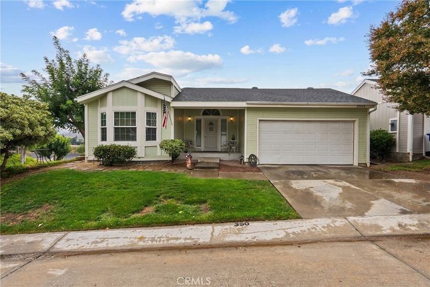 WELCOME HOME!  Private corner lot with fantastic view. Recently painted exterior and interior. Newer roof. Upgraded plank laminate and carpet flooring throughout/recessed lighting/ceiling fans in both bedrooms and living room. Remodeled Kitchen, large center island with granite, ample cabinet space  and newer appliances.  Primary bedroom with slider to outside patio.  Both bathrooms have been upgraded with granite counters and newer vanities - primary bath with deep soaking tub and separate shower.  Living room with cozy fireplace and additional slider to the back yard.  Open flowing floorplan. Separate indoor laundry room.  Direct access to 2 car garage. Nice size backyard with a view of the valley. This home is located in Canyon View Estates  which includes community amenities such as a 24/7 guard gate,  usage of 2 pools and spa, 2 sport courts, and 2 play areas. Canyon View also a has available a community clubhouse and RV storage. Home is located near Discovery park, bike & walking paths, highly rated schools and shopping. Easy freeway access. Welcome Home!!