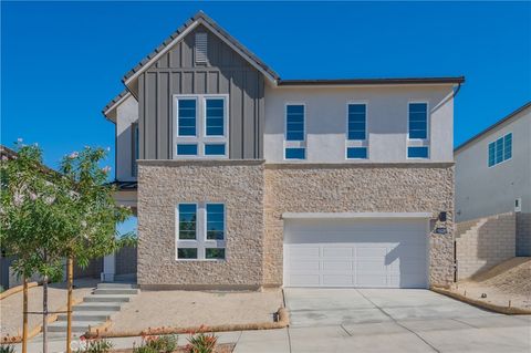 Photo of 27562 Juniper Lane Ln, Valencia, CA 91381 (MLS # OC25253646)