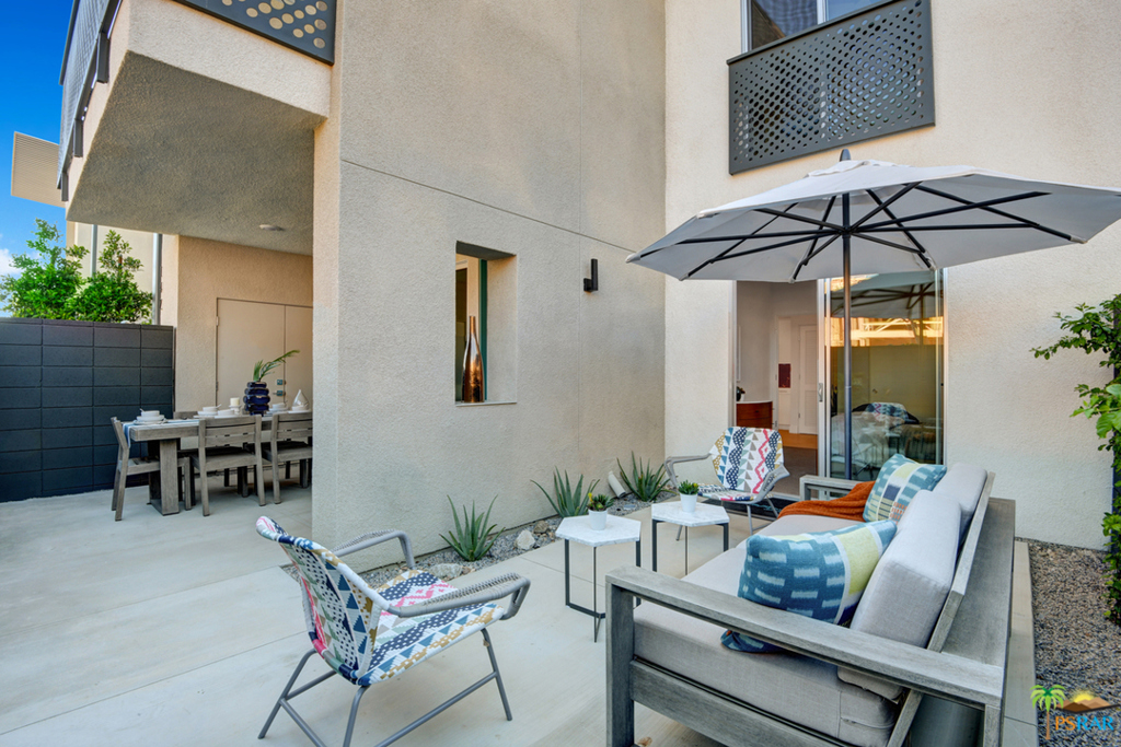 64@theRiv delivers a new generation of dwelling for 21st-century living. Located at the SE corner of Indian Canyon Dr & E Via Escuela, adjacent to the Rivera Hotel & Spa. 1226 SF, 2 bd 2 ba, great-room, social kitchen, 9' ceilings, 8' sliders & clerestory windows. Incredible fit & finish details include 24x24 designer tiled flooring, carpeted bedrooms, quartz countertops & backsplash & custom cabinetry. Standard fixture package includes Whirlpool, Grohe, Kohler & designer lighting. Exterior elevations showcase a mid-century inspired architecture that takes advantage of surrounding mountain views. Energy/Green features low-E glass, LED lighting, tankless water-heater, green-guard cert. quartz, a walled & gated patio for privacy, and more. Gated Community with resort-style pool/spa, fire-pit conversation area, and stunning mountain views! Images depict Model Home and do not represent actual homesites.