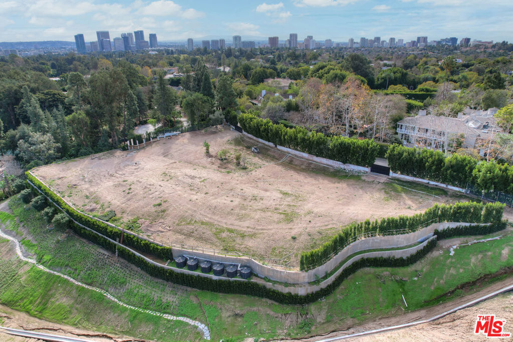 Prime location to build One's Dream Home in the middle of Holmby Hills. The property comes with Plans and Permits for a SAOTA Designed home, currently designed for approx. 27,000 sq ft of living space . Buyer could start immediate building process, construction budget and schedule are available. Broker does not guarantee the accuracy of the information provided, including lot size, lot acreage, lot dimensions, square footage measurements and/or permissibility to build. Buyer is advised to independently verify the accuracy of this information through personal inspection, building permits, and/or appropriate professionals (i.e. attorney, appraiser, architect surveyor, etc.).