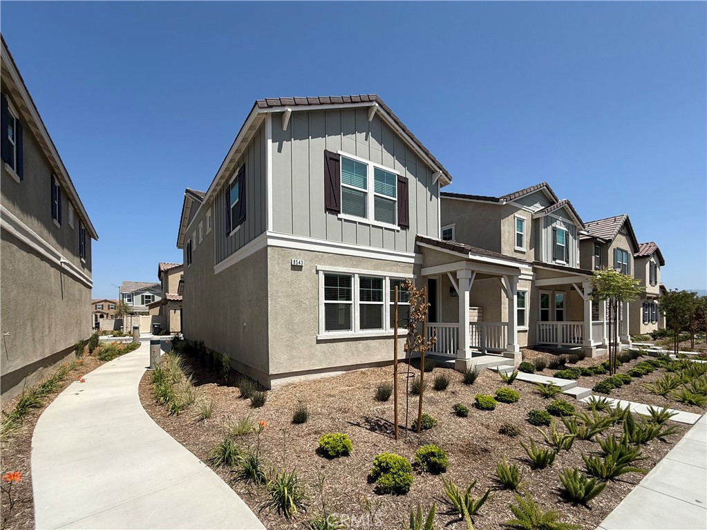 Fully furnished, Modern New Community directly across from Brand New Preserve Shopping Center. This floor plan offers a great open 1547 sq/ft floor plan with 9-ft ceiling with luxury upgrades. Home features a desirable kitchen with modern island, whirlpool stainless steel appliances, Quartz White Countertop with custom backsplash in kitchen, White raised Cabinets, single basin kitchen sink, dual undermounted sinks in bath1 & 2, Prewire TV mount, Window blinds, Oak Luxury vinyl plank flooring on main level, Taupe textured carpet on 2nd floor, recess lights thru out. The upstairs lead to a spacious primary bedroom with a large walk-in-closet and luxurious adjoining bath with double sink and large walk-in shower. A upstairs laundry room and Linen closet are added for more convenience. EV pre-wired in the garage. Future community amenities include community pool/spa/meeting center, Pickleball court, BBQ/Picnic area and park. Photo is rendering of the model. Buyer can either lease or purchase the solar. Also Monet is part of great schools: highly coveted Legacy Academy and Chino Hills High School.