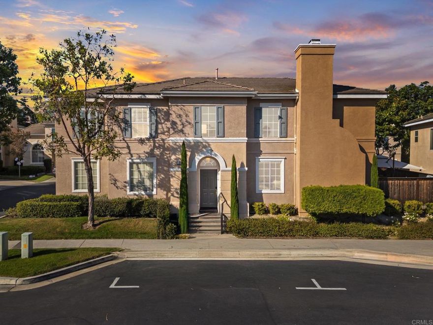 Must see to believe — this corner-lot designer home in the sought-after gated community of Park Lane offers resort-style living with a sparkling pool and spa just steps away. Step inside to soaring ceilings, sunlit spaces, and a beautifully updated interior that blends modern design with timeless details. The bright kitchen is a showpiece—freshly painted white cabinetry, elegant marble countertops, a stylish backsplash, and a center island with bar seating make it the heart of the home. The open-concept layout flows seamlessly into the living room with its cozy fireplace and the dining room’s classic wainscoting. Upstairs, a spacious loft with an enclave offers the perfect spot for a playroom, home office, or media area, or it can be converted to a 4th bedroom. The primary suite is pure serenity—adorned with a chandelier, wainscoting, a walk-in closet, and a spa-inspired ensuite featuring dual sinks, a soaking tub, and a walk-in shower. Both secondary bedrooms feature custom wall details, and the upstairs laundry room impresses with mosaic tile flooring, subway-tiled walls, and extra storage. Upgrades abound: plantation shutters, chic lighting fixtures, new fence (2022), refrigerator (2022), dishwasher (2024), and more. Enjoy a two-car garage and the ideal location—minutes from the beach, close to shopping, dining, and top-rated schools. This home is not just move-in ready—it’s magazine-ready.