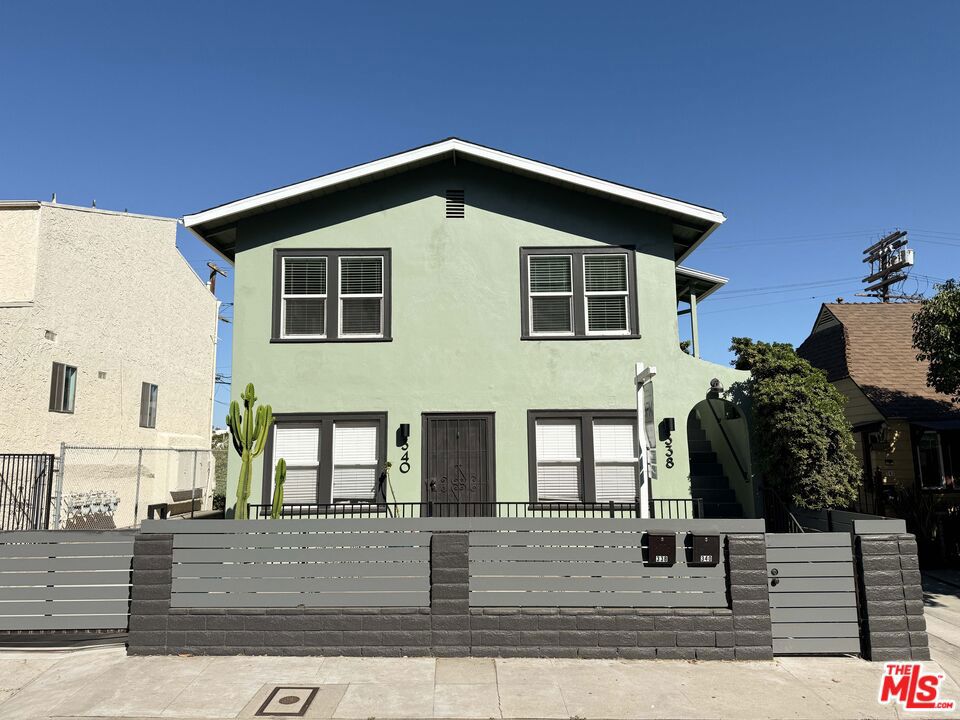 Thoughtfully updated and ideally located, this charming 2-bedroom, 1-bath upper duplex sits at the crossroads of Silver Lake, Downtown, and Koreatown, offering the perfect home base for exploring LA's most dynamic neighborhoods at an attainable price.Step outside and you're just minutes from the best of the city. Grab your morning coffee and pastries at local favorite Doubting Thomas (a 10-minute stroll), or wind down with spicy fried chicken and cold beer at Crawford's, only five minutes away. You're a short drive from vibrant Silver Lake dining and nightlife, sunset swan boat rides at Echo Park Lake, or spontaneous gallery hopping in the Arts District.Inside, the unit features a spacious open-concept living room anchored by a charming faux fireplace, creating instant ambiance. A private balcony provides unobstructed views of the Downtown LA skyline. The full kitchen boasts stainless steel appliances, modern cabinetry, and an open layout perfect for entertaining. The recently updated bathroom features colorful, custom tile work, and the in-unit washer and dryer add everyday convenience.Additional highlights include central heat and air conditioning, no shared walls or upstairs neighbors, and stylish fixtures and finishes throughout. The small, well-maintained building has fresh exterior paint, updated lighting, drought-tolerant landscaping, and even a fruit-bearing orange tree cared for by a professional gardener.This hidden gem offers the rare blend of character, modern comforts, and a hard-to-beat location-to-value ratio. Street parking. Small dogs welcome with additional pet deposit/rent. Schedule your showing today homes like this don't stay on the market for long.