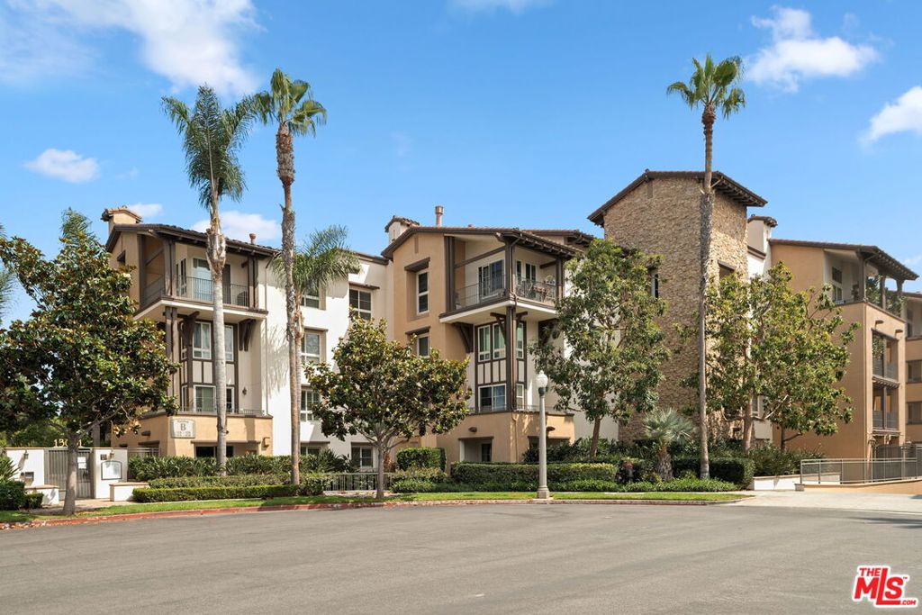 Stunning 2BR Plus Den (which could be a 3rd Bedroom) Two-Story Condo in a Resort-Style Community. Welcome to this beautifully updated two-story condo in the highly sought-after Villosa community, with gleaming hardwood floors and thoughtful design throughout, this home offers both style and comfort. The main level features a versatile bedroom perfect as a guest room or home office alongside a bright and modern kitchen with a large island, plus newer white quartz countertops. The kitchen flows seamlessly into the dining area and living room, where a cozy fireplace creates a warm, inviting atmosphere. Outdoor patio offers the perfect setting for alfresco dining and relaxation. Upstairs is a luxurious primary suite with a sitting area, a spa-like bathroom, and a custom built-in closet. One other bedroom en suite plus laundry area! Enjoy resort-style amenities including two pools, two fitness centers, and a recreation center, all within the beautifully maintained grounds. This is the ideal blend of elegance, function, and lifestyle all in a premier community.