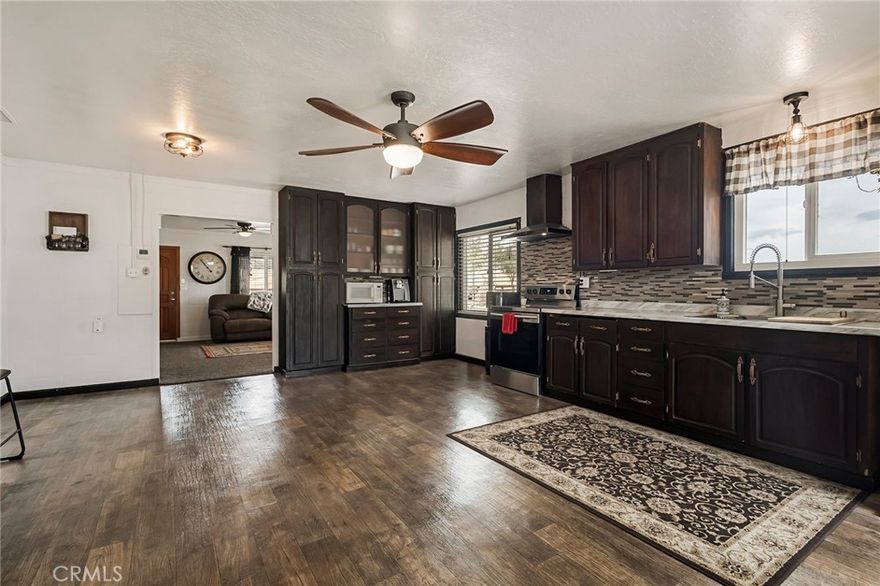 Discover a slice of rural bliss with this charming multi-family home set on a sprawling, picturesque ranch in Orland, California. If privacy, space, and the potential for rental income are what you're after, this property could very well end your search—no treasure map needed.

This delightful residence offers three cozy bedrooms and one well-appointed bathrooms. The interior has been thoughtfully updated with $125,000 in upgrades, including new windows that invite the California sunshine right into your living spaces. The heart of the home features a wood-burning stove, providing a rustic touch and a warm focal point during cooler evenings.

With 1,342 square feet of living space, the house fosters a welcoming atmosphere without forgoing comfort. The thoughtfully 1 bedroom, one bathroom designed mother-in-law unit adds versatility to this property, perfect for hosting guests or for a rental opportunity. Integrated solar panels ensure energy efficiency and savings with owned solar, highlighting the home’s blend of traditional charm and modern amenities.

Stepping outside, the magic continues. The property boasts ample outdoor space complete with a horse property setup, a well-maintained animal barn, and an accessory dwelling unit (ADU) allowing for numerous possibilities, whether you're an equestrian enthusiast or looking to cultivate a small farm. Parking is generous here, making it easy for family and friends to come by and soak in the rural charm. The home is only a stone’s throw from Orland's quaint sights and necessary shops, ensuring you don't have to trade convenience for serenity.

Nearby, Black Butte Lake and Grindstone Community Park offer scenic vistas and abundant recreational activities, ideal for weekend outings or a spontaneous picnic. This property isn't just a home; it's a lifestyle. Whether you're gathering fresh eggs from chicken coop in the morning or cozying up by the wood stove at night, life here feels a touch more adventurous, a pinch more serene, and exactly where you want to be. Join us, where the breath of fresh country air is always free, and the sunsets are included at no extra charge.