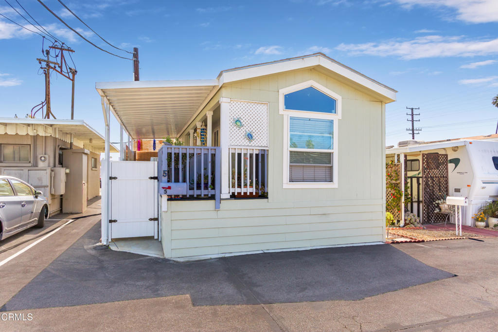 Welcome to this delightful and efficiently designed mobile home, nestled in the quiet senior park of Buena Villa Senior Mobile Home Park (55+). A bright, airy and open living area provides plenty of room for your every need. With new flooring, repainted cabinets, and furniture included, everything is here for you to move right in! An private oasis waits for you in the cozy front porch, perfect for your morning coffee or afternoon relaxation. . Furniture is included. Come see your home away from home!