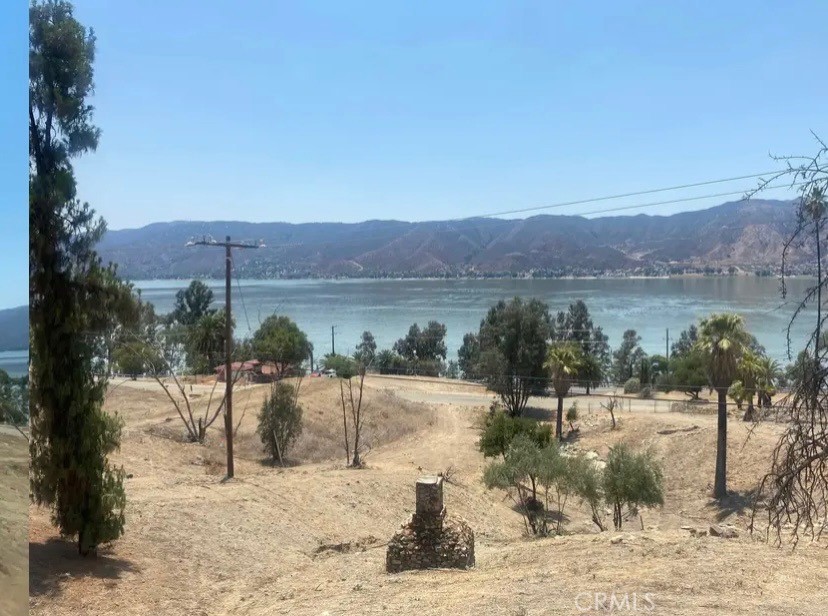 ***SELLER FINANCING AVAILABLE WITH 50% DOWN*** This 6,098 sqft lot in Lake Elsinore offers stunning lake views and is zoned RH (Residential Hillside), providing excellent potential for residential development. With the ability to build a single-family home, this property offers a perfect balance of tranquility and accessibility. The scenic lake view enhances its appeal, making it an ideal spot for those seeking a serene, yet conveniently located, property. Whether you're a builder or investor, this lot is a fantastic opportunity to capitalize on the area’s growth. Buyer and buyer's agent to do their due diligence to verify all information.
