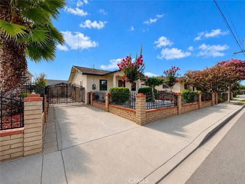 Photo of 1067 1069 S Rowan Avenue, East Los Angeles, CA 90023 (MLS # MB26162731)
