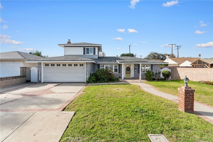 OPEN HOUSE SUNDAY 12/21 from 1-3pm! Rare find just in time for Christmas! Just over 2,000sf, 5 bedroom 2 bath home in a great family oriented North Pomona neighborhood. 4 bedrooms downstairs and a separate primary suite with bathroom upstairs offers additional privacy in a split floorplan and easily accommodate multigenerational family members with limited mobility. This home has been very well maintained with some updates over the years from original. This home is absolutely move in ready, complete your personal design touches and modern upgrades on your own timeline. Mature landscaping and gardens with a variety of well established citrus and fruit trees. Located in a neighborhood of mixed new homes and older homes this area shows pride of ownership and positive development. Walking distance to a variety of schools for all ages, convenient access to 10, 60 and 57 freeways.