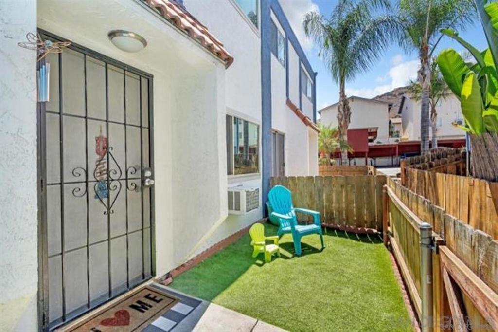 Seller will help buy interest rate down with full price offer! This charming condo, nestled in a wonderful Lakeside neighborhood, is an ideal opportunity for a first-time homebuyer. It boasts numerous upgrades, including beautiful laminate flooring and newer dual-pane windows that let in plenty of natural light. The kitchen is bright and features sleek stainless steel appliances, and for added convenience, there's an in-unit stackable washer and dryer. You'll also appreciate the great yard space with brand new turf, perfect for barbecuing and relaxing. You'll also appreciate the great yard space with brand new turf, perfect for barbecuing and relaxing. The location is truly unbeatable, with restaurants, shops, and local convenience stores all within walking distance. It's also close to excellent schools and offers easy freeway access. This is an opportunity you won't want to miss!